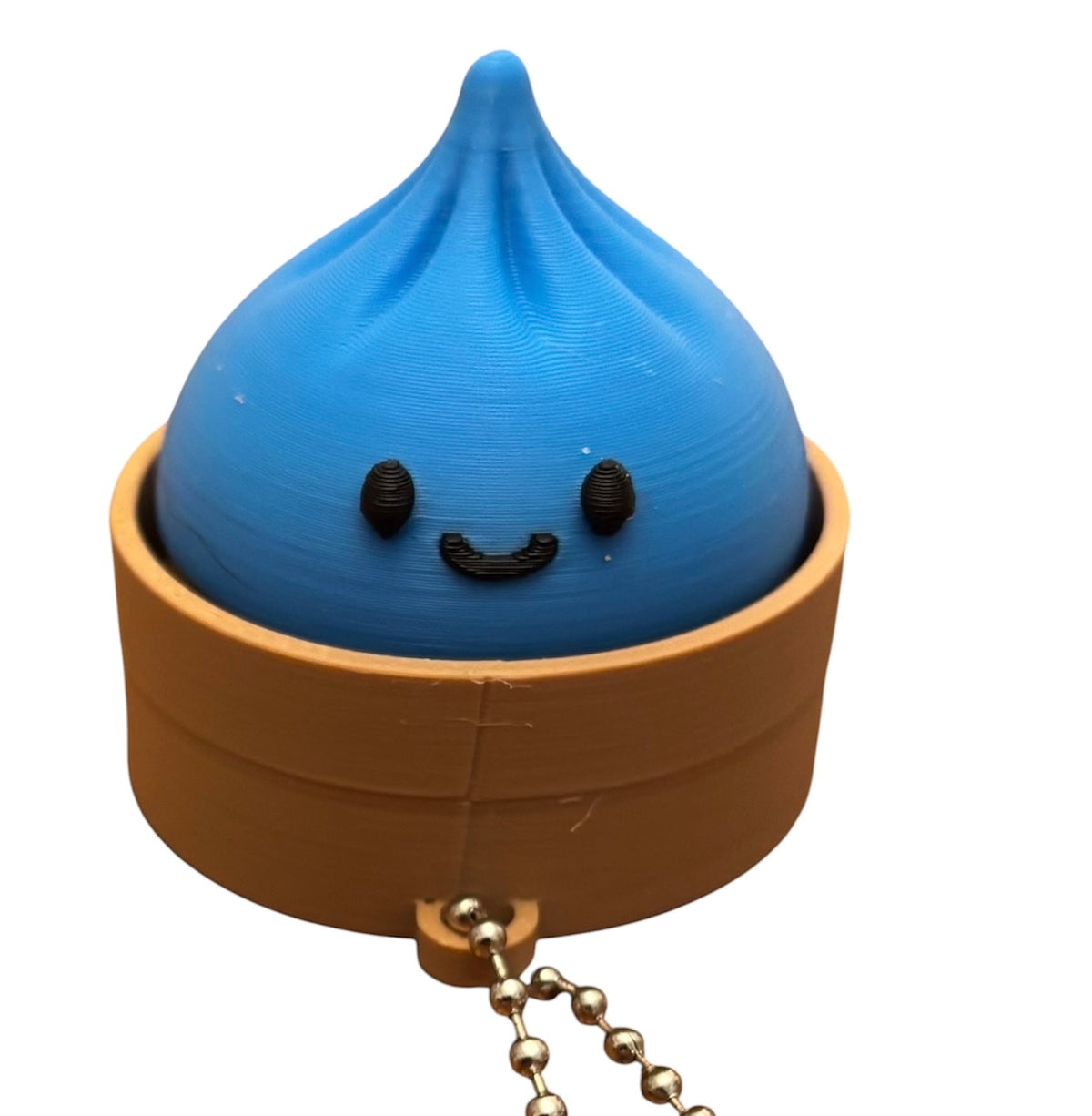 3D Printed Dumpling Clicker Fidget Toy – Cyan/Caramel